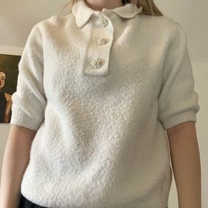 Off white top with bejeweled buttons